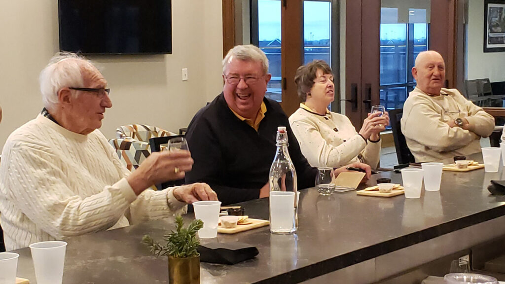 Residents of The Summit enjoy a taste-testing party at Stratus. Besides a wide variety of alcoholic beverages, the facility’s rooftop bar entertains guests with light appetizers and other food choices such as skewers, shrimp cocktail, riblets mini quiche.