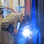 A student participates in a recent welding competition hosted by Eastern Iowa Community Colleges.