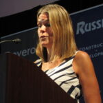Michelle Steining addresses the QCBJ's Fastest Growing Companies event