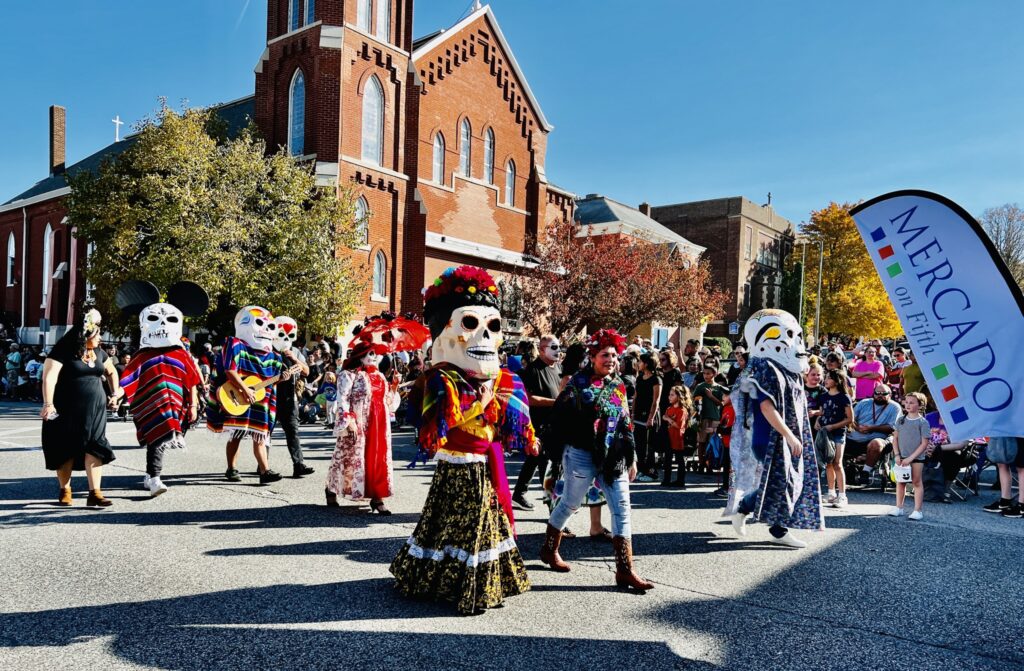 The Day of the Day parade – a new addition to the offerings from Moline’s Mercado on Fifth – featured more than 80 entries celebrating the souls of lost family members.