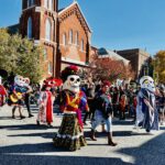 The Day of the Day parade – a new addition to the offerings from Moline’s Mercado on Fifth – featured more than 80 entries celebrating the souls of lost family members.