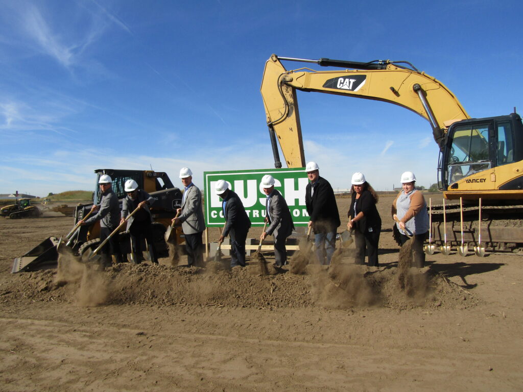 Iowa American Water and Bush Construction officials take part in a ground-breaking ceremony on Tuesday, Oct. 4.