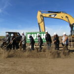 Iowa American Water and Bush Construction officials take part in a ground-breaking ceremony on Tuesday, Oct. 4.