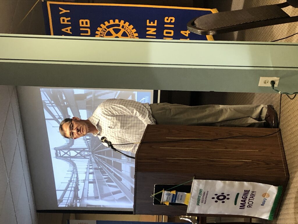 George Ryan, the Interstate 74 corridor manager, discusses the ongoing demolition work on the old I-74 bridge at the Moline Rotary Club on Monday, Jan. 9.