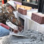 The Stanley Center for Peace and Security placed a time capsule behind three cornerstones to seal in the 122-year legacy of the site of its new headquarters. Its legacy grows as the first Living Building in Iowa and one of only 30 in the world.