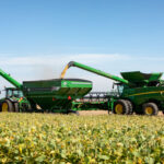 John Deere machines are utilized in the field to help with the 2022 harvest in Illinois.