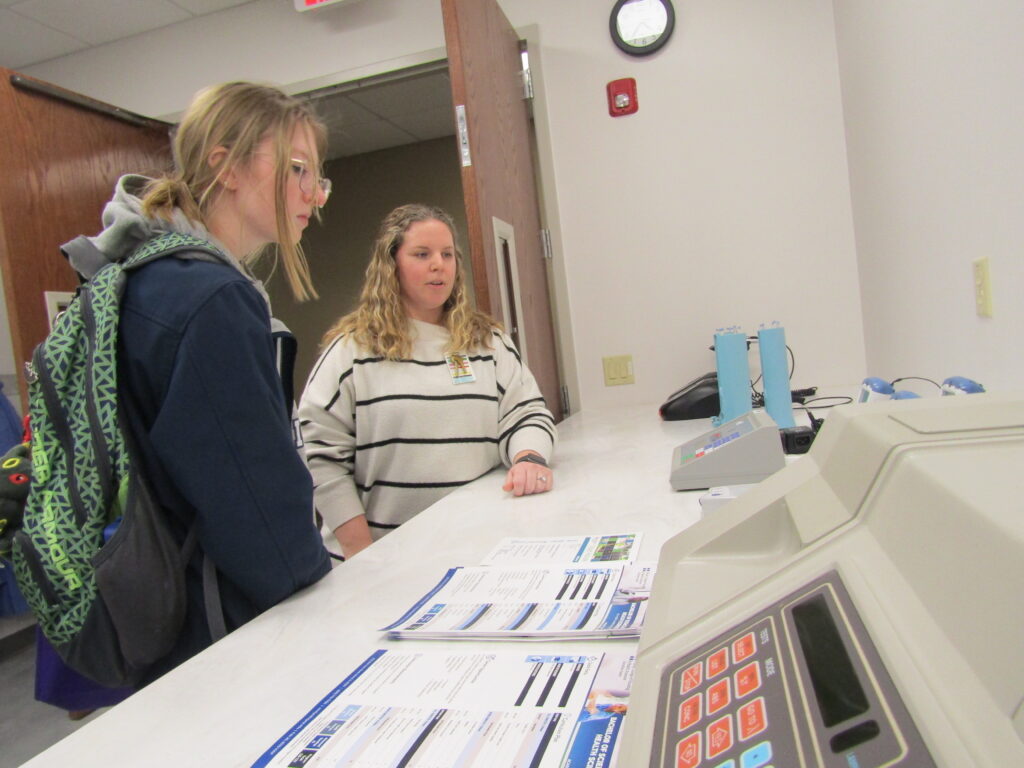 Abigail Burger, left, looks over medical equipment as Stephanie Tieso, Trinity College of Nursing & Health Sciences medical laboratory science program director, gives her a tour of a college lab on Tuesday, Feb. 21.