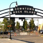 “Welcome to Downtown Rock Island” archway and sign across from Schwiebert Riverfront Park at 1st Avenue and 18th Street.