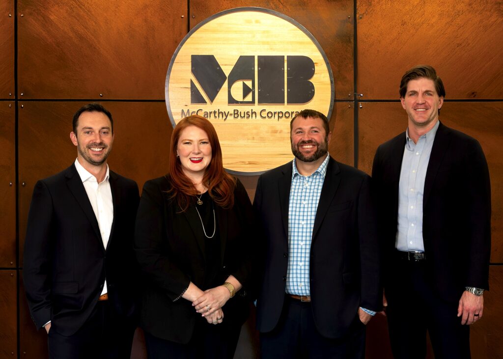Members of the McCarthy-Bush Corp. team include, from left, Ben Bush, sales and business development director for Oertel Metal Works; Maureen (Bush) Roe, project contracting and risk manager for McCarthy Improvement; Mike Bush, the new CEO of the McCarthy-Bush Corp.; and John Bush, construction controller with McCarthy-Bush. CREDIT MCCARTHY-BUSH CORP.