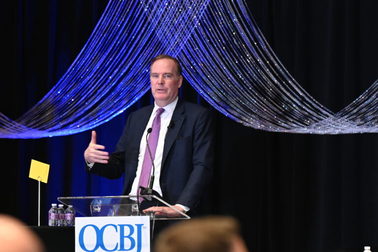 Michael Gapen, chief U.S. Economist for Morgan Stanley, gives his take on where the economy stands and what's ahead at the QCBJ's Economic Review Luncheon Wednesday, May 13, at the Rhythm City Casino Resort. (PHOTOS BY TODD WELVAERT)