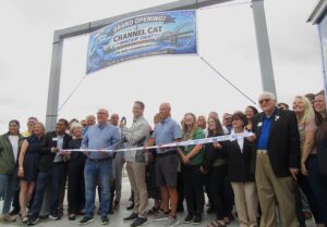 A ribbon-cutting ceremony is held for the updated Channel Cat Water Taxi service dock area at 2100 E. River Drive, Davenport, during a grand reopening ceremony on Friday, June 5. CREDIT DAVE THOMPSON