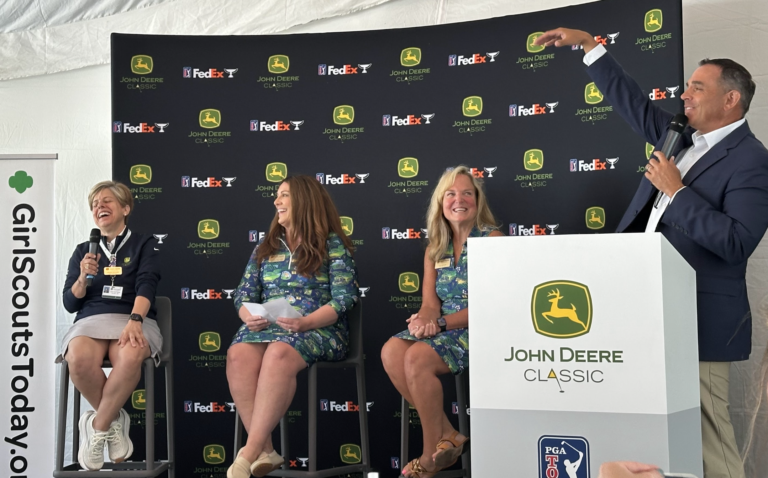 Three John Deere Classic chairs take the stage Tuesday, June 30, for a panel discussion at the Executive Women's Day at TPC Deere Run. They are from left, Laura 'Divot' Ekizian, current Chair Wendy Williams and Sue Rector, along with emcee Matt Randazzo. CREDIT JENNIFER DEWITT